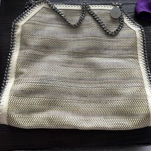 White and black hand bag